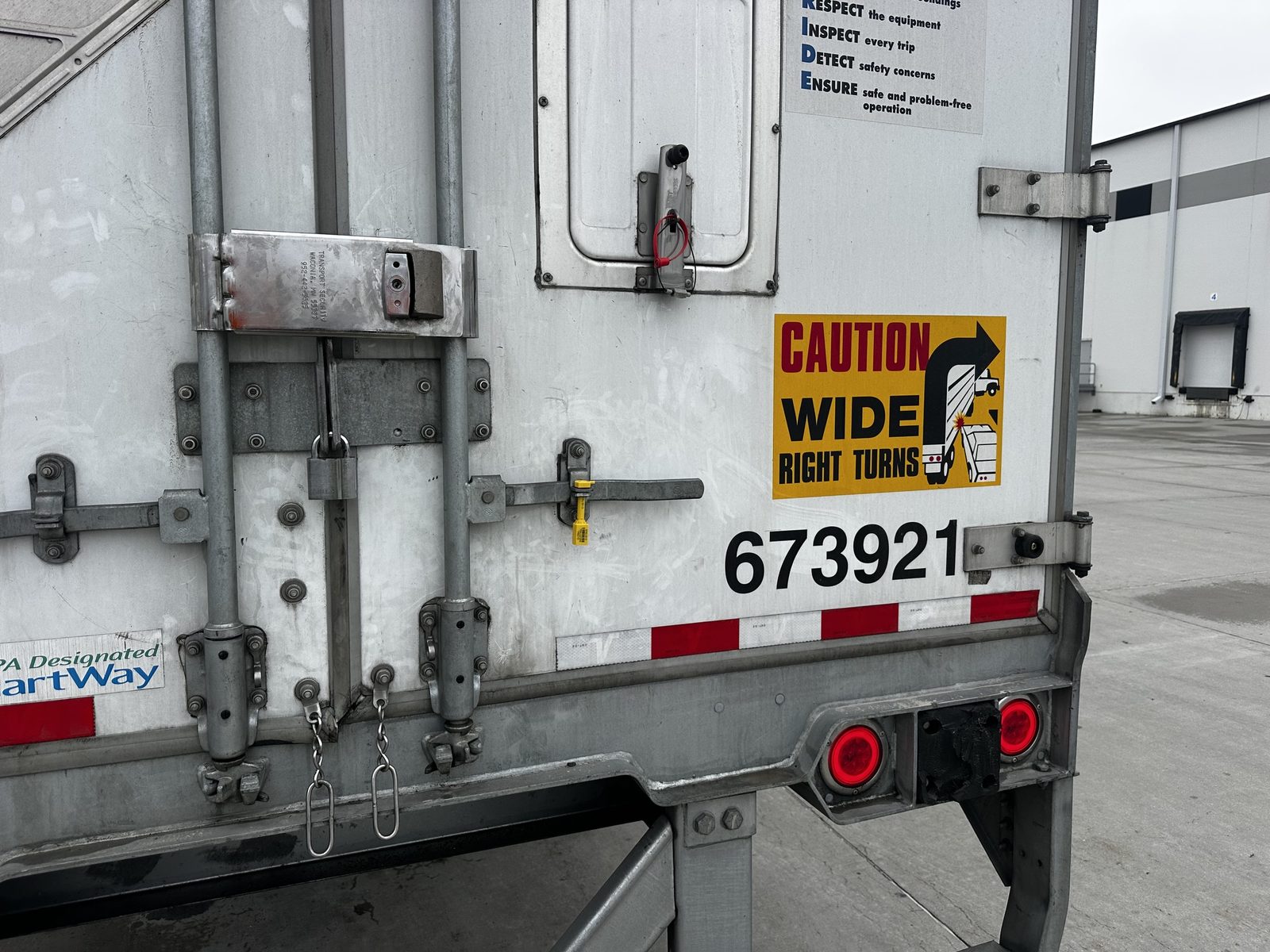 Trailer doors locked with Abloy Enforcer, padlock, and seal
