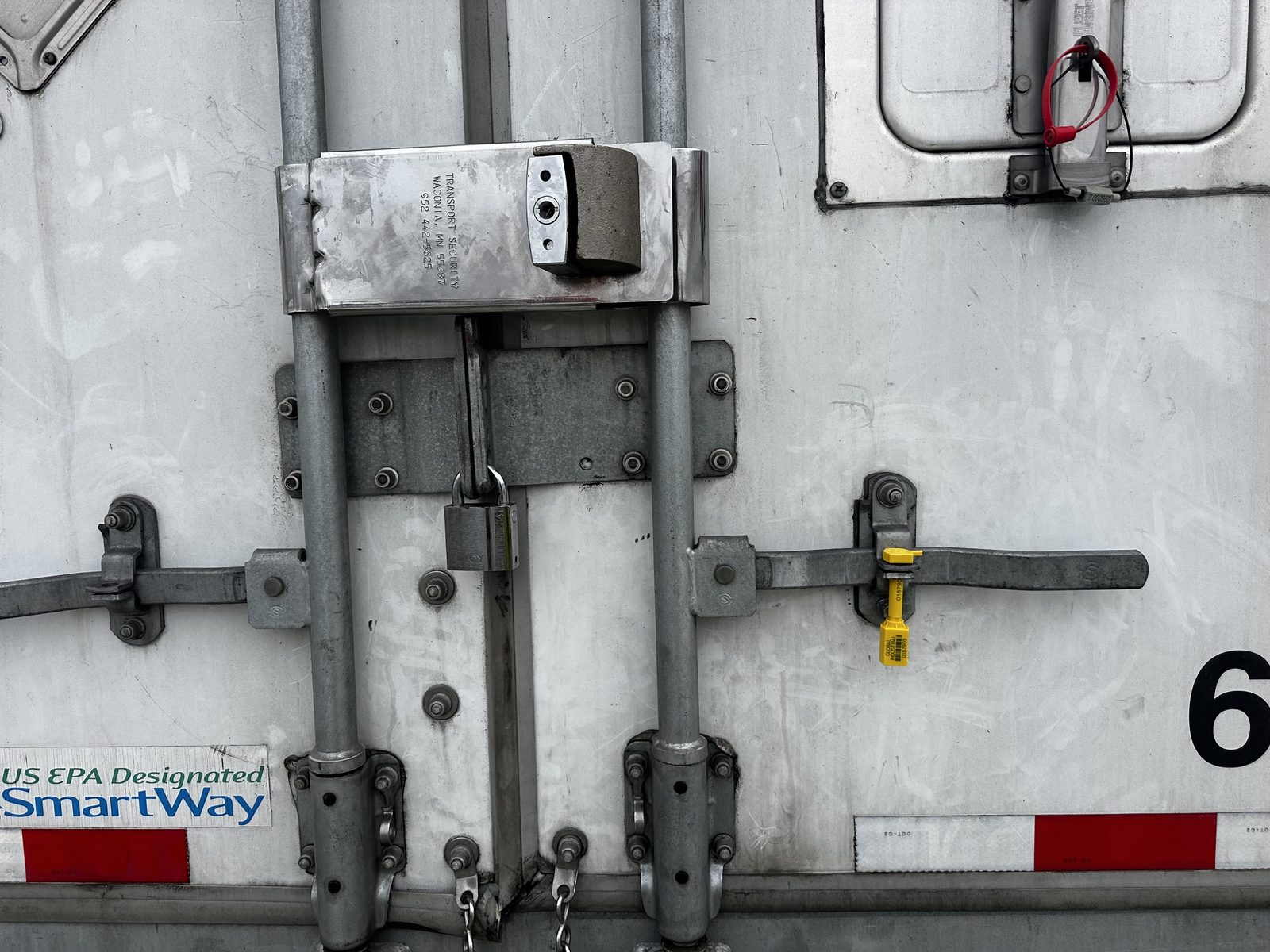 Abloy L-series Enforcer lock and padlock on trailer doors